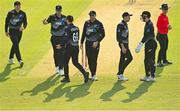 18 July 2022; Lockie Ferguson of New Zealand, 69, is congratulated by teammates after catching the wicket of George Dockrell of Ireland during the Men's T20 International match between Ireland and New Zealand at Stormont in Belfast. Photo by Ramsey Cardy/Sportsfile