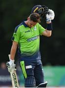 18 July 2022; Mark Adair of Ireland after losing his wicket during the Men's T20 International match between Ireland and New Zealand at Stormont in Belfast. Photo by Ramsey Cardy/Sportsfile