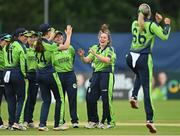 19 July 2022; Ireland players celebrate a wicket during the Women's T20 International match between Ireland and Pakistan at Bready Cricket Club in Bready, Tyrone. Photo by Ramsey Cardy/Sportsfile