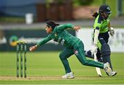 19 July 2022; Fatima Sana of Pakistan attempts to run out Rachel Delaney of Ireland during the Women's T20 International match between Ireland and Pakistan at Bready Cricket Club in Bready, Tyrone. Photo by Ramsey Cardy/Sportsfile