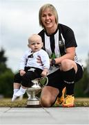 21 July 2022; Whitehall Rangers captain Charlie Graham with Alex Morgan, age 10 months, son of manager Gavin Morgan during the 2022 FAI Women's Intermediate Cup Final Media Day at FAI HQ in Dublin. Photo by David Fitzgerald/Sportsfile