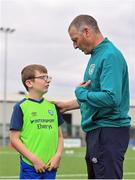 21 July 2022; Republic of Ireland U21s Manager Jim Crawford and participant Cillian Mullins during the Football For All Summer Soccer School at St Patrick's Boys AFC in Carlow. Photo by Seb Daly/Sportsfile