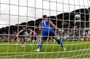 23 July 2022; Aidomo Emakhu of Shamrock Rovers scores his side's first goal, past Drogheda United goalkeeper Colin McCabe, during the SSE Airtricity League Premier Division match between Shamrock Rovers and Drogheda United at Tallaght Stadium in Dublin. Photo by Seb Daly/Sportsfile