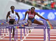 23 July 2022; Nia Ali of USA, right, competes in the women's 100m hurdles heats during day nine of the World Athletics Championships at Hayward Field in Eugene, Oregon, USA. Photo by Sam Barnes/Sportsfile