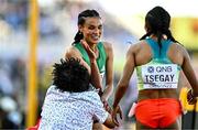 23 July 2022; Letesenbet Gidey of Ethiopia is lifted up by a spectator who ran on to the track after the women's 5000m final during day nine of the World Athletics Championships at Hayward Field in Eugene, Oregon, USA. Photo by Sam Barnes/Sportsfile