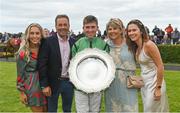 27 July 2022; Jockey Jordan Gainford with his family, from left, sister Gemma, father Colin, mother Avril and sister Andrea after winning the Tote Galway Plate on Hewick during day three of the Galway Races Summer Festival at Ballybrit Racecourse in Galway. Photo by Seb Daly/Sportsfile