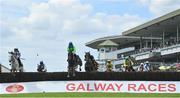 28 July 2022; Fakiera, centre, with Jack Kennedy up, leads the field over the first during the Guinness Beginners Steeplechase on day four of the Galway Races Summer Festival at Ballybrit Racecourse in Galway. Photo by Seb Daly/Sportsfile