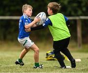 28 July 2022; Ollie Holden, left, during the Bank of Ireland Leinster Rugby Summer Camp at Kilkenny RFC in Kilkenny. Photo by Harry Murphy/Sportsfile