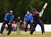 29 July 2022; Cade Carmichael of Northern Knights plays a shot watched by Leinster Lightning wicketkeeper Lorcan Tucker during the Cricket Ireland Inter-Provincial Trophy match between Northern Knights and Leinster Lightning at Pembroke Cricket Club in Dublin. Photo by Sam Barnes/Sportsfile