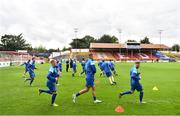 31 July 2022; Bluebell United players warm-up before the Extra.ie FAI Cup First Round match between Bluebell United and Galway United at Tolka Park in Dublin. Photo by Ben McShane/Sportsfile