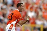 23 May 2004; Steven McDonnell, Armagh, celebrates after scoring his sides first goal. Bank of Ireland Ulster Senior Football Championship, Monaghan v Armagh, St. Tighernach's Park, Clones, Co. Monaghan. Picture credit; Pat Murphy / SPORTSFILE