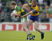 23 May 2004; Michael Francis Russell, Kerry, in action against David Russell, Clare. Bank of Ireland Munster Senior Football Championship, Clare v Kerry, Cusack Park, Ennis, Co. Clare. Picture credit; Brendan Moran / SPORTSFILE
