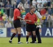23 May 2004; Referee Gerry Kinneavy holds a bandage to the back of his head after receiving a cut following an accidental clash with a Clare player before having to leave the field for medical attention. He subsequently returned to referee the second half. Bank of Ireland Munster Senior Football Championship, Clare v Kerry, Cusack Park, Ennis, Co. Clare. Picture credit; Brendan Moran / SPORTSFILE
