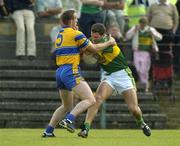 23 May 2004; Eoin Brosnan, Kerry, in action against Noel Griffin, Clare. Bank of Ireland Munster Senior Football Championship, Clare v Kerry, Cusack Park, Ennis, Co. Clare. Picture credit; Brendan Moran / SPORTSFILE