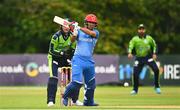 15 August 2022; Najibullah Zadran of Afghanistan and Ireland wicketkeeper Lorcan Tucker during the Men's T20 International match between Ireland and Afghanistan at Stormont in Belfast. Photo by Ramsey Cardy/Sportsfile