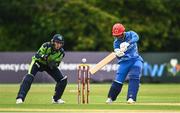 15 August 2022; Azmatullah Omarzai of Afghanistan and Ireland wicketkeeper Lorcan Tucker during the Men's T20 International match between Ireland and Afghanistan at Stormont in Belfast. Photo by Ramsey Cardy/Sportsfile