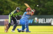 15 August 2022; Najibullah Zadran of Afghanistan and Ireland wicketkeeper Lorcan Tucker during the Men's T20 International match between Ireland and Afghanistan at Stormont in Belfast. Photo by Ramsey Cardy/Sportsfile