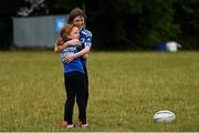 16 August 2022; Sisters Hannah and Hazel Bromley during the Bank of Ireland Leinster Rugby Summer Camp at DLSP RFC in Dublin. Photo by Harry Murphy/Sportsfile