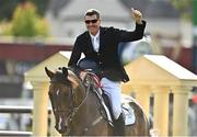 17 August 2022; Paul O'Shea of Ireland celebrates after winning The Sport Ireland Classic on Skara Glen's Machu Picchu during the Longines FEI Jumping Nations Cup Dublin Horse Show at the RDS in Dublin.  Photo by Sam Barnes/Sportsfile