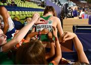 19 August 2022; Supporters take the name plate off Ciara Mageean of Ireland after she finished second in the Women's 1500m Final during day 9 of the European Championships 2022 at the Olympiastadion in Munich, Germany. Photo by Ben McShane/Sportsfile
