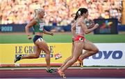 21 August 2022; Sarah Lavin of Ireland, left, on her way to finishing third in Heat 2 of the Women's 100m Hurdles Semi Final during day 11 of the European Championships 2022 at the Olympiastadion in Munich, Germany. Photo by David Fitzgerald/Sportsfile