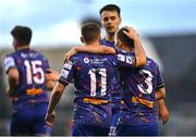 26 August 2022; Liam Burt of Bohemians, 11, celebrates with teammate Tyreke Wilson, 3, after scoring their side's first goal during the Extra.ie FAI Cup second round match between Lucan United and Bohemians at Dalymount Park in Dublin. Photo by Seb Daly/Sportsfile