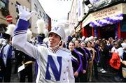 27 August 2022; The Northwestern Wildcats band and cheerleaders perform outside Fitzsimons bar during the pre-match tailgate at Temple Bar in Dublin ahead of the The Aer Lingus College Football Classic 2022 match between Northwestern Wildcats and Nebraska Cornhuskers. Photo by Sam Barnes/Sportsfile
