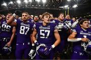 27 August 2022; Northwestern Wildcats linebacker Greyson Metz with teammates after their side's victory in the Aer Lingus College Football Classic 2022 match between Northwestern Wildcats and Nebraska Cornhuskers at Aviva Stadium in Dublin. Photo by Ben McShane/Sportsfile
