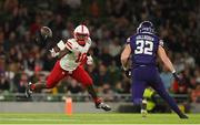27 August 2022; Nebraska Cornhuskers running back Anthony Grant fumbles a catch during the Aer Lingus College Football Classic 2022 match between Northwestern Wildcats and Nebraska Cornhuskers at Aviva Stadium in Dublin. Photo by Brendan Moran/Sportsfile
