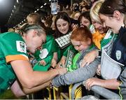 1 September 2022; Louise Quinn of Republic of Ireland with supporters after the FIFA Women's World Cup 2023 qualifier match between Republic of Ireland and Finland at Tallaght Stadium in Dublin. Photo by Seb Daly/Sportsfile