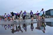 6 September 2022; Runners warm-up before competing in the Grant Thornton Corporate 5K Challenge at Kennedy Quay in Cork. Photo by Sam Barnes/Sportsfile