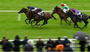 11 September 2022; Above The Curve, left, with Ryan Moore up, on their way to winning the Moyglare 'Jewels' Blandford Stakes, from second place Insinuendo, 3, with Colin Keane up, on day two of the Longines Irish Champions Weekend at The Curragh Racecourse in Kildare. Photo by Seb Daly/Sportsfile