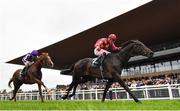 11 September 2022; Al Riffa, right, with Dylan Browne McMonagle up, on their way to winning the Goffs Vincent O'Brien National Stakes on day two of the Longines Irish Champions Weekend at The Curragh Racecourse in Kildare. Photo by Seb Daly/Sportsfile