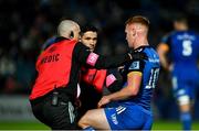 23 September 2022; Ciarán Frawley of Leinster is treated by Leinster head physiotherapist Garreth Farrell and team doctor Stuart O'Flanagan during the United Rugby Championship match between Leinster and Benetton at the RDS Arena in Dublin. Photo by Harry Murphy/Sportsfile