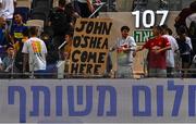 27 September 2022; A banner for Republic of Ireland assistant coach John O'Shea in the crowd before the UEFA European U21 Championship play-off second leg match between Israel and Republic of Ireland at Bloomfield Stadium in Tel Aviv, Israel. Photo by Seb Daly/Sportsfile