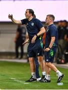 27 September 2022; Republic of Ireland assistant coach John O'Shea, left, and assistant manager Alan Reynolds during the UEFA European U21 Championship play-off second leg match between Israel and Republic of Ireland at Bloomfield Stadium in Tel Aviv, Israel. Photo by Seb Daly/Sportsfile