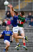 2 October 2022; Conor McCarthy of Scotstown in action against Andrew Woods of Inniskeen during the Monaghan County Senior Club Football Championship Semi-Final match between Inniskeen and Scotstown at St Tiernach's Park in Clones, Monaghan. Photo by Philip Fitzpatrick/Sportsfile