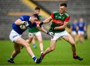 2 October 2022; Mark McCarvelle of Scotstown in action against Ciaran McNulty of Inniskeen during the Monaghan County Senior Club Football Championship Semi-Final match between Inniskeen and Scotstown at St Tiernach's Park in Clones, Monaghan. Photo by Philip Fitzpatrick/Sportsfile