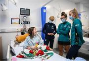 4 October 2022; Republic of Ireland manager Vera Pauw and players Izzy Atkinson, right, and Keeva Keenan with Poppy Betson, age 10, from Malahide, during a visit to Cappagh Kids and The National Orthopaedic Hospital Cappagh in Dublin. Photo by Stephen McCarthy/Sportsfile