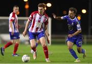 7 October 2022; Jack Lynch of Treaty United in action against Shane Griffin of Waterford during the SSE Airtricity League First Division match between Waterford and Treaty United at RSC in Waterford. Photo by Michael P Ryan/Sportsfile