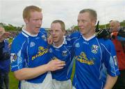 30 May 2004; Cavan players, l to r, Dermot McCabe, Anthony Forde and Jason O'Reilly celebrate their sides victory over Down. Bank of Ireland Ulster Senior Football Championship Replay, Cavan v Down, Kingspan Breffni Park, Co. Cavan. Picture credit; Matt Browne / SPORTSFILE