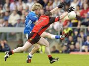 30 May 2004; Michael Lyng, Cavan, in action against Sean Farrell, Down. Bank of Ireland Ulster Senior Football Championship Replay, Cavan v Down, Kingspan Breffni Park, Co. Cavan. Picture credit; Matt Browne / SPORTSFILE