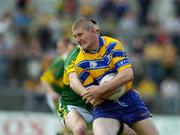 23 May 2004; David Russell, Clare, in action against Darragh O'Se, Kerry. Bank of Ireland Munster Senior Football Championship, Clare v Kerry, Cusack Park, Ennis, Co. Clare. Picture credit; Brendan Moran / SPORTSFILE