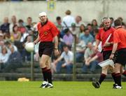 23 May 2004; Referee Gerry Kinneavy comes out for the start of the second half with his head bandaged after receiving 3 stitches after an accidental clash with Clare's Ger Quinlan. Bank of Ireland Munster Senior Football Championship, Clare v Kerry, Cusack Park, Ennis, Co. Clare. Picture credit; Brendan Moran / SPORTSFILE