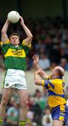 23 May 2004; William Kirby, Kerry, in action against Donal O'Sullivan, Clare. Bank of Ireland Munster Senior Football Championship, Clare v Kerry, Cusack Park, Ennis, Co. Clare. Picture credit; Brendan Moran / SPORTSFILE