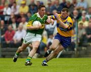 23 May 2004; Declan O'Sullivan, Kerry, in action against Brian Considine, Clare. Bank of Ireland Munster Senior Football Championship, Clare v Kerry, Cusack Park, Ennis, Co. Clare. Picture credit; Brendan Moran / SPORTSFILE