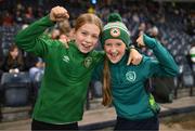 11 October 2022; Republic of Ireland supporters Cara Murphy, age 10, left, and Sophie Murphy, age 11, both from Leixlip, Dublin, before the FIFA Women's World Cup 2023 Play-off match between Scotland and Republic of Ireland at Hampden Park in Glasgow, Scotland. Photo by Stephen McCarthy/Sportsfile