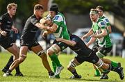 15 October 2022; Seán O'Brien of Naas is tackled by Tom Mulcair, left, and Darragh O'Callaghan of Old Belvedere during the Energia All-Ireland League Division 1B match between Old Belvedere and Naas RFC at Old Belvedere RFC in Dublin. Photo by Sam Barnes/Sportsfile