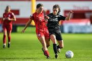 22 October 2022; Keeva Keenan of Shelbourne is tackled by Amy Boyle-Carr of Sligo Rovers during the SSE Airtricity Women's National League match between Shelbourne and Sligo Rovers at Tolka Park in Dublin. Photo by Tyler Miller/Sportsfile