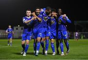 26 October 2022; Phoenix Patterson of Waterford, second from right, celebrates with teammates, from left, Darragh Power, Yassine En-Neyah, Wassim Aouachria and Junior Quitirna after scoring their side's second goal during the SSE Airtricity League First Division play-off semi-final first leg match between Treaty United and Waterford at Markets Field in Limerick. Photo by Seb Daly/Sportsfile
